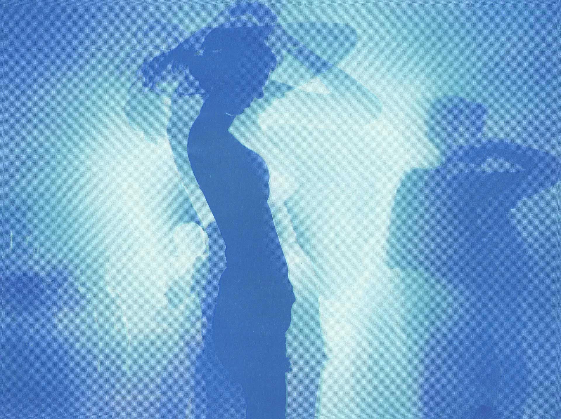 Risograph print. Woman on a foggy dance floor lit from behind with a strobe light.