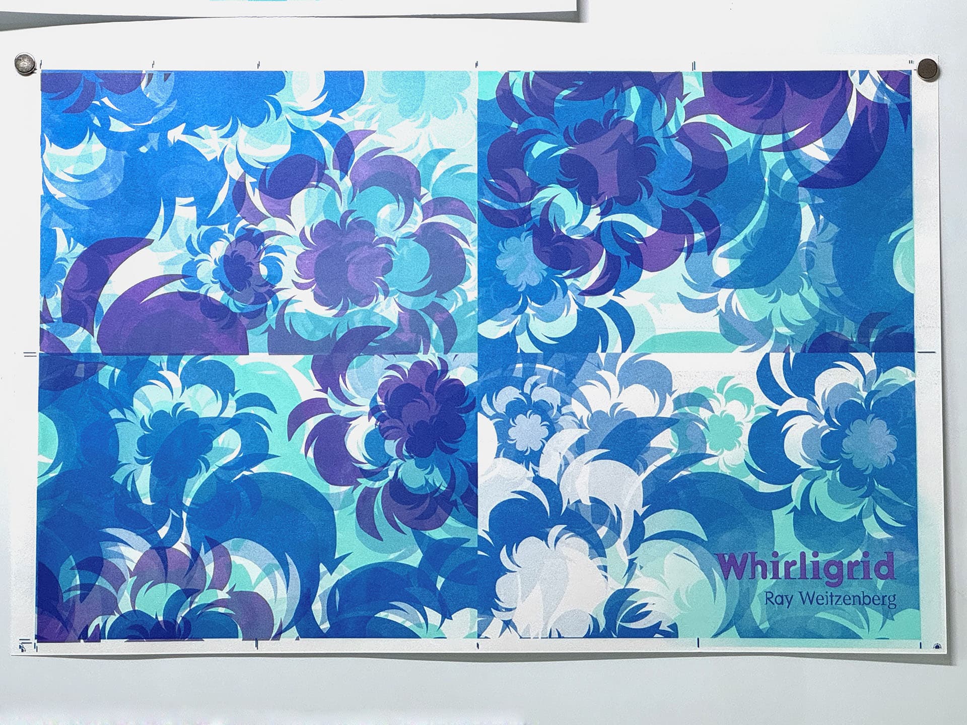 Printed spread on a wall prior to trimming and folding